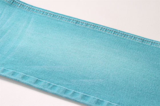 Хорошая цена 9 Oz Специальный зеленый цвет растяжка летний джинсы ткань джинсы ткань для мужчины весенний летний стиль горячая продажа готовы к отправке онлайн