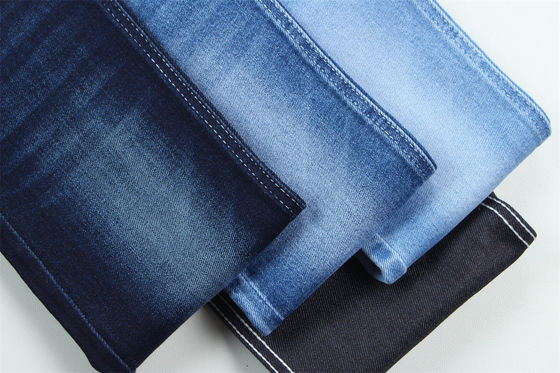 Хорошая цена 10 Oz Super Stretch Джинсовая ткань для летнего мужчины Джинсы хлопчатобумажная полиэстерная краска Спандекс грубый и дикий онлайн