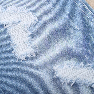 Хорошая цена 100% хлопчатобумажная жесткая джинсовая твиловая ткань для джинсов и одежды онлайн